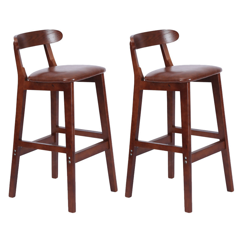 Modern Armless Counter Stool Wood Household Bar Stool with Pedal and Cushion Dark Brown Brown 2 Piece Set Clearhalo 'Bar Furniture' 'Bar Stools' 'bar_stools' 'furn' 'furn_bar_stools' 'furniture_bar_stools' 'Kitchen & Dining Furniture' 'kitchen&dining_furn' 'kitchen' 'kitchen_furn' Furniture' 4212190