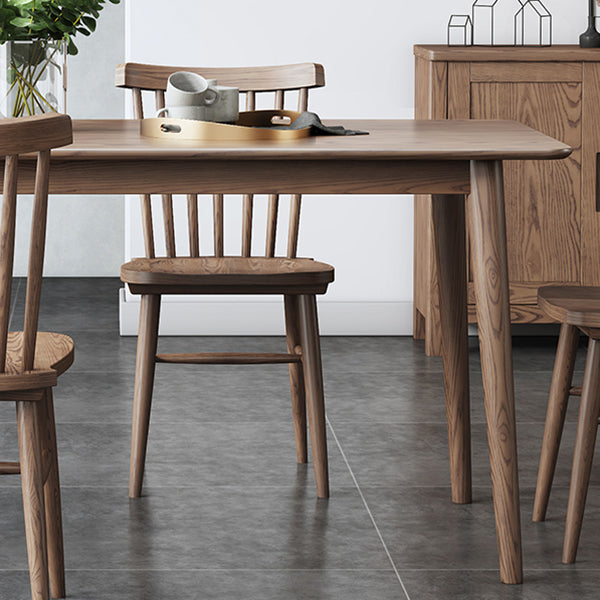 Modern Brown Dining Table Rectangle Solid Wood Dining Table with 4 Legs Clearhalo ' dining_table' 'Dining Tables & Seating' 'Dining Tables' 'furn' 'furn_dining_table' 'Furniture' 'furniture_dining_table' 'Kitchen & Dining Furniture' 'kitchen&dining_furn' 'kitchen' 'kitchen_dining_table' 4239214