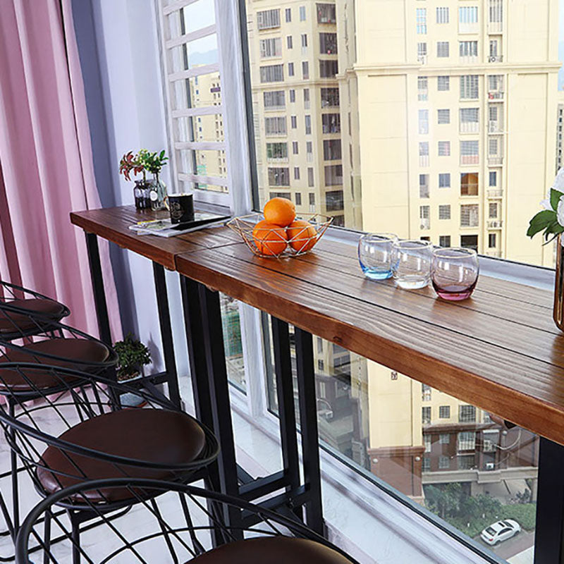 Industrial Brown Pine Bar Dining Table Rectangle Indoor Bistro Table with Footrest Clearhalo 'Bar Furniture' 'Bar Tables' 'bar_tables' 'furn' 'furn_bar_tables' 'Furniture' 'furniture_bar_tables' 'Kitchen & Dining Furniture' 'kitchen&dining_furn' 'kitchen' 4258256