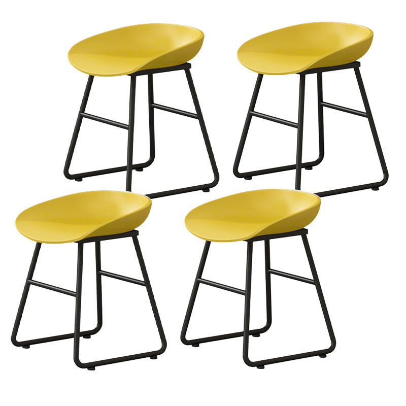 Contemporary Bucket Counter Bar Stool Armless Plastic Bar Stool with Footrest, Iron Base Yellow 4 Piece Set Short Stool(18"H) Clearhalo 'Bar Furniture' 'Bar Stools' 'bar_stools' 'furn' 'furn_bar_stools' 'furniture_bar_stools' 'Kitchen & Dining Furniture' 'kitchen&dining_furn' 'kitchen' 'kitchen_furn' Furniture' 4259088