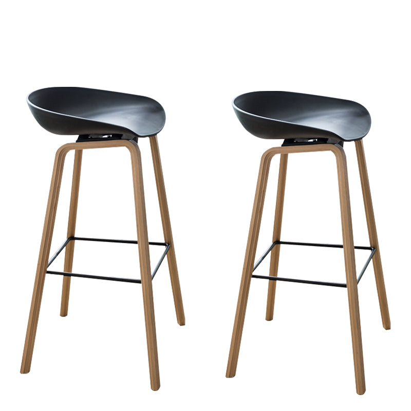 Modern Plastic Counter Stool Footrest Low Back Bucket Coffee Shop Bar Stool with Wood Legs Black 2 Piece Set Clearhalo 'Bar Furniture' 'Bar Stools' 'bar_stools' 'furn' 'furn_bar_stools' 'furniture_bar_stools' 'Kitchen & Dining Furniture' 'kitchen&dining_furn' 'kitchen' 'kitchen_furn' Furniture' 4275812