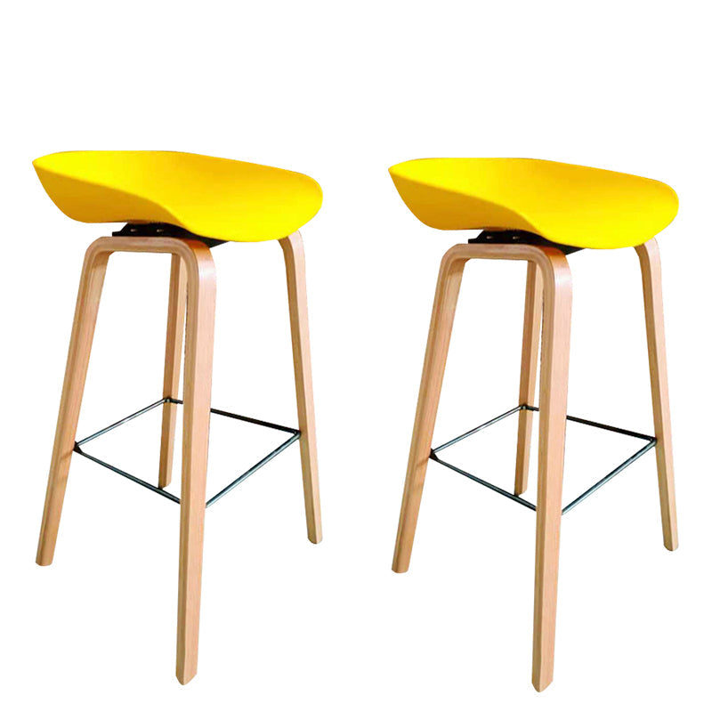 Modern Plastic Counter Stool Footrest Low Back Bucket Coffee Shop Bar Stool with Wood Legs Yellow 2 Piece Set Clearhalo 'Bar Furniture' 'Bar Stools' 'bar_stools' 'furn' 'furn_bar_stools' 'furniture_bar_stools' 'Kitchen & Dining Furniture' 'kitchen&dining_furn' 'kitchen' 'kitchen_furn' Furniture' 4275815
