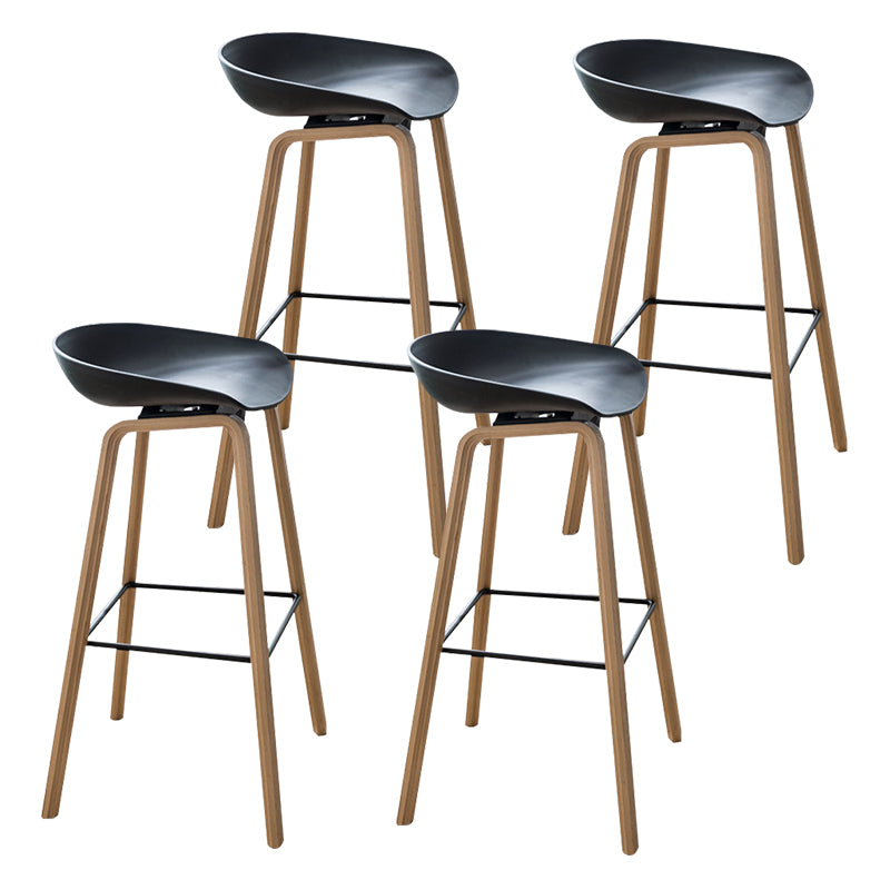 Modern Plastic Counter Stool Footrest Low Back Bucket Coffee Shop Bar Stool with Wood Legs Black 4 Piece Set Clearhalo 'Bar Furniture' 'Bar Stools' 'bar_stools' 'furn' 'furn_bar_stools' 'furniture_bar_stools' 'Kitchen & Dining Furniture' 'kitchen&dining_furn' 'kitchen' 'kitchen_furn' Furniture' 4275819