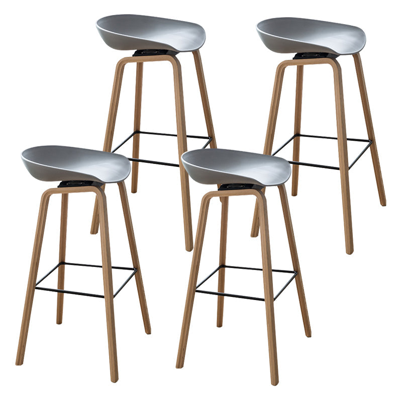 Modern Plastic Counter Stool Footrest Low Back Bucket Coffee Shop Bar Stool with Wood Legs Grey 4 Piece Set Clearhalo 'Bar Furniture' 'Bar Stools' 'bar_stools' 'furn' 'furn_bar_stools' 'furniture_bar_stools' 'Kitchen & Dining Furniture' 'kitchen&dining_furn' 'kitchen' 'kitchen_furn' Furniture' 4275820