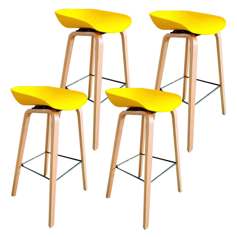 Modern Plastic Counter Stool Footrest Low Back Bucket Coffee Shop Bar Stool with Wood Legs Yellow 4 Piece Set Clearhalo 'Bar Furniture' 'Bar Stools' 'bar_stools' 'furn' 'furn_bar_stools' 'furniture_bar_stools' 'Kitchen & Dining Furniture' 'kitchen&dining_furn' 'kitchen' 'kitchen_furn' Furniture' 4275821