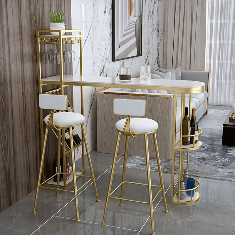 Stone Indoor Glam Bar Dining Table Metal Double Pedestal Bistro Table with Wine Rack 55.1"L x 15.7"W x 41.3"H Gold Without Chairs Clearhalo 'Bar Furniture' 'Bar Tables' 'bar_tables' 'furn' 'furn_bar_tables' 'Furniture' 'furniture_bar_tables' 'Kitchen & Dining Furniture' 'kitchen&dining_furn' 'kitchen' 4296282
