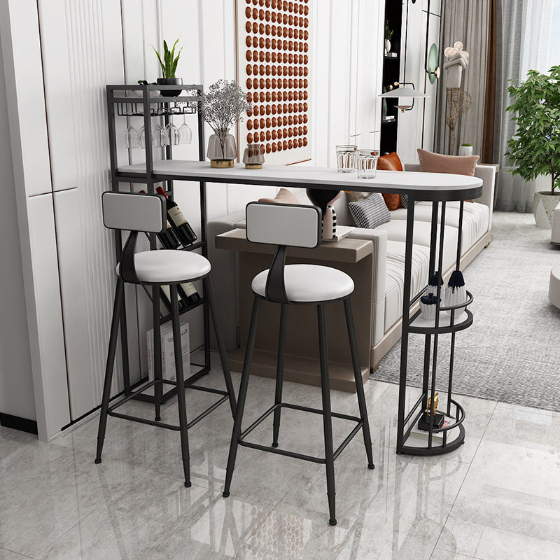 Stone Indoor Glam Bar Dining Table Iron Double Pedestal Bistro Table with Wine Rack Black 55.1"L x 15.7"W x 41.3"H Clearhalo 'Bar Furniture' 'Bar Tables' 'bar_tables' 'Furniture' 'furniture_bar_tables' 'Kitchen & Dining Furniture' 'kitchen&dining_furn' 'kitchen' 4296319