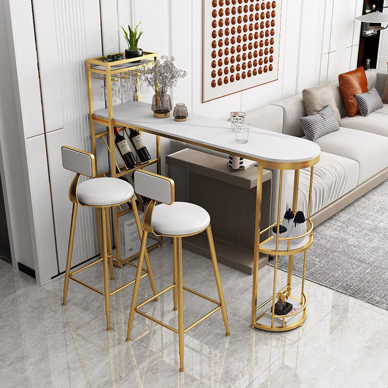 Stone Indoor Glam Bar Dining Table Iron Double Pedestal Bistro Table with Wine Rack Gold 70.9"L x 15.7"W x 41.3"H Clearhalo 'Bar Furniture' 'Bar Tables' 'bar_tables' 'Furniture' 'furniture_bar_tables' 'Kitchen & Dining Furniture' 'kitchen&dining_furn' 'kitchen' 4296320
