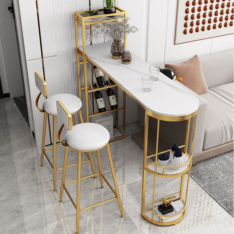 Stone Indoor Glam Bar Dining Table Iron Double Pedestal Bistro Table with Wine Rack Gold 63"L x 15.7"W x 41.3"H Clearhalo 'Bar Furniture' 'Bar Tables' 'bar_tables' 'Furniture' 'furniture_bar_tables' 'Kitchen & Dining Furniture' 'kitchen&dining_furn' 'kitchen' 4296325