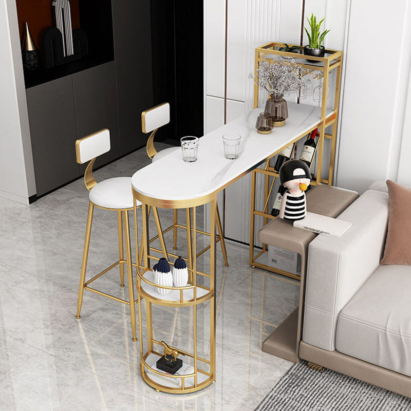 Stone Indoor Glam Bar Dining Table Iron Double Pedestal Bistro Table with Wine Rack Gold 55.1"L x 15.7"W x 41.3"H Clearhalo 'Bar Furniture' 'Bar Tables' 'bar_tables' 'Furniture' 'furniture_bar_tables' 'Kitchen & Dining Furniture' 'kitchen&dining_furn' 'kitchen' 4296326