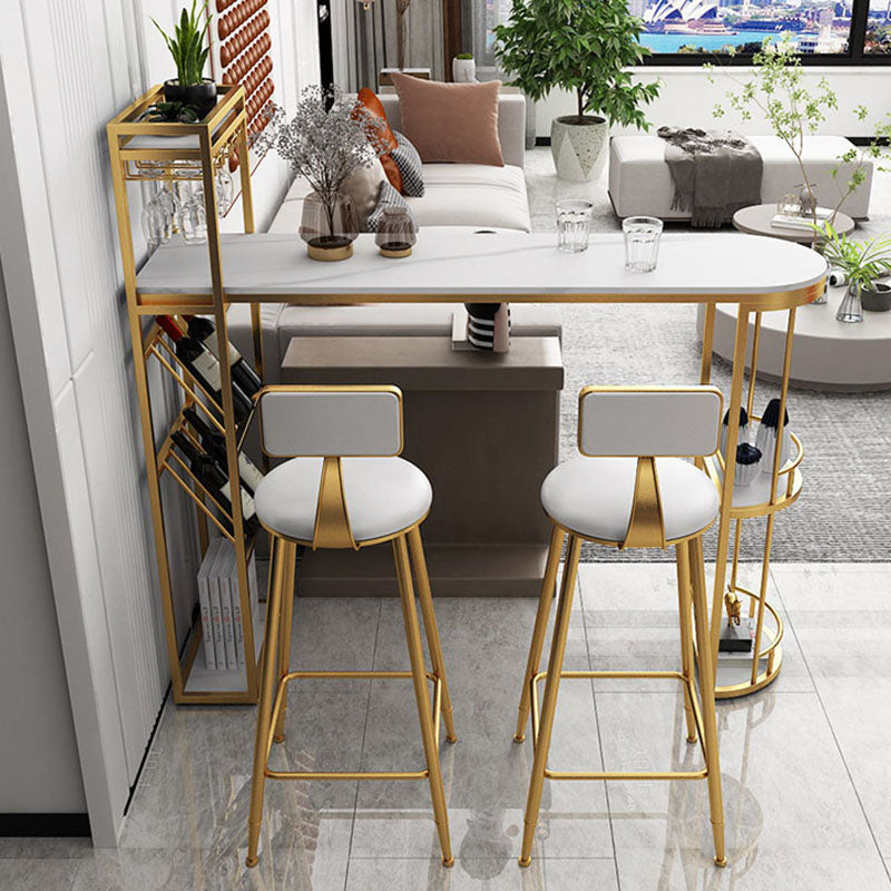 Stone Indoor Glam Bar Dining Table Iron Double Pedestal Bistro Table with Wine Rack Gold 47.2"L x 15.7"W x 41.3"H Clearhalo 'Bar Furniture' 'Bar Tables' 'bar_tables' 'Furniture' 'furniture_bar_tables' 'Kitchen & Dining Furniture' 'kitchen&dining_furn' 'kitchen' 4296327