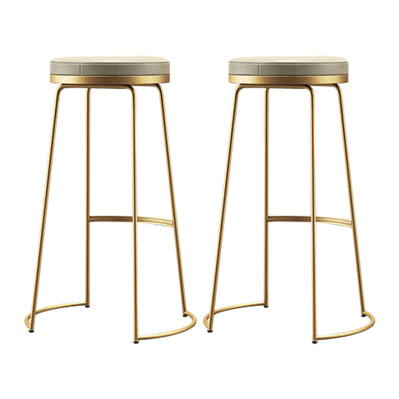 Modern Counter Round Bar Stool Armless Leather Backless Bar Stool with Footrest Gold 2 Piece Set Clearhalo 'Bar Furniture' 'Bar Stools' 'bar_stools' 'furn' 'furn_bar_stools' 'furniture_bar_stools' 'Kitchen & Dining Furniture' 'kitchen&dining_furn' 'kitchen' 'kitchen_furn' Furniture' 4297174