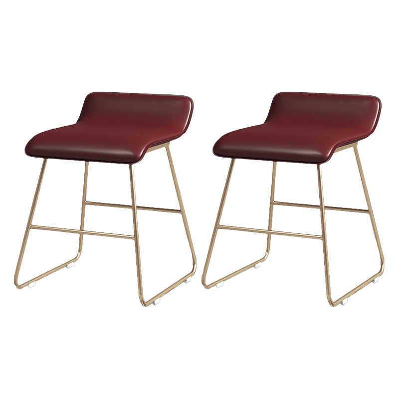 Glam Counter Round Bar Stool Armless Leather Bar Stool with Footrest Iron Base Red 2 Piece Set Short Stool(18"H) Clearhalo 'Bar Furniture' 'Bar Stools' 'bar_stools' 'furn' 'furn_bar_stools' 'furniture_bar_stools' 'Kitchen & Dining Furniture' 'kitchen&dining_furn' 'kitchen' 'kitchen_furn' Furniture' 4297318