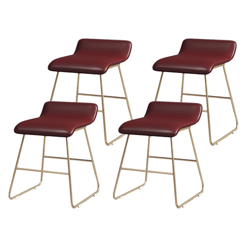 Glam Counter Round Bar Stool Armless Leather Bar Stool with Footrest Iron Base Red 4 Piece Set Short Stool(18"H) Clearhalo 'Bar Furniture' 'Bar Stools' 'bar_stools' 'furn' 'furn_bar_stools' 'furniture_bar_stools' 'Kitchen & Dining Furniture' 'kitchen&dining_furn' 'kitchen' 'kitchen_furn' Furniture' 4297320