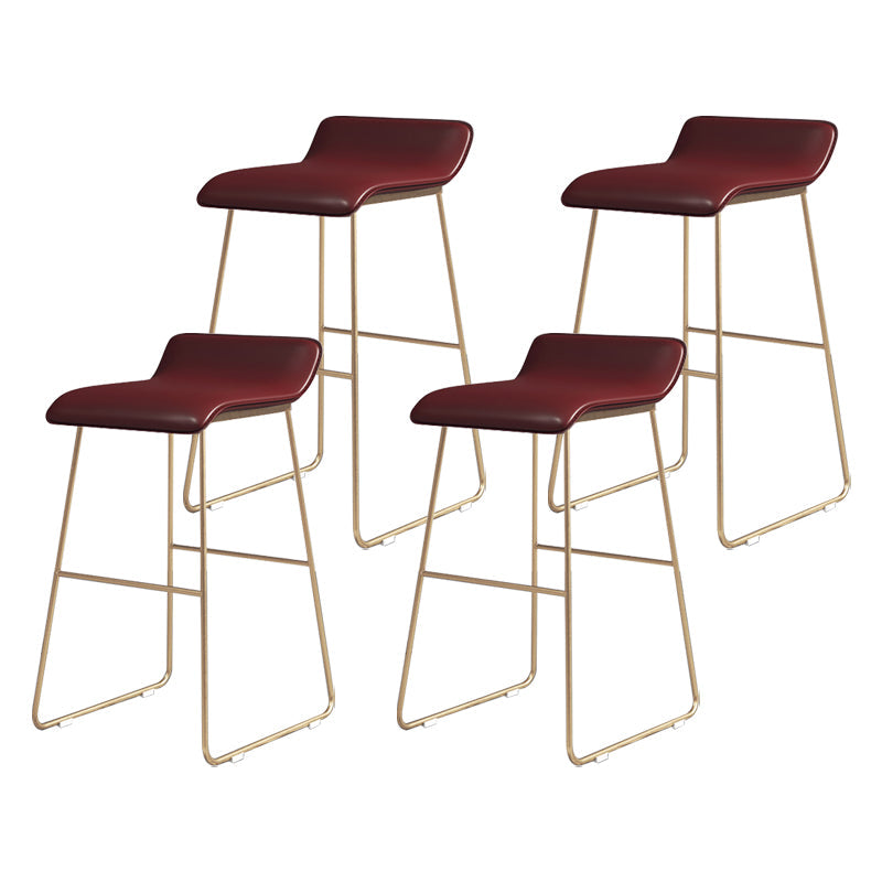 Glam Counter Round Bar Stool Armless Leather Bar Stool with Footrest Iron Base Red 4 Piece Set Counter Stool(26"H) Clearhalo 'Bar Furniture' 'Bar Stools' 'bar_stools' 'furn' 'furn_bar_stools' 'furniture_bar_stools' 'Kitchen & Dining Furniture' 'kitchen&dining_furn' 'kitchen' 'kitchen_furn' Furniture' 4297326