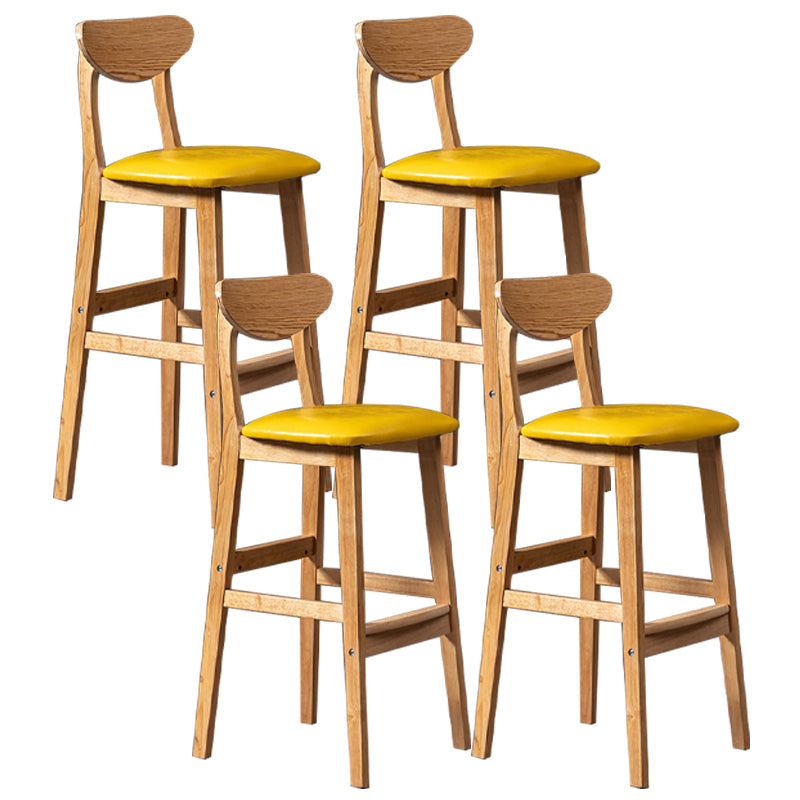Scandinavian Padded Feet Barstools Restaurant Solid Wood Counter Barstool Light Yellow 4 Piece Set Clearhalo 'Bar Furniture' 'Bar Stools' 'bar_stools' 'furn' 'furn_bar_stools' 'furniture_bar_stools' 'Kitchen & Dining Furniture' 'kitchen&dining_furn' 'kitchen' 'kitchen_furn' Furniture' 4329720