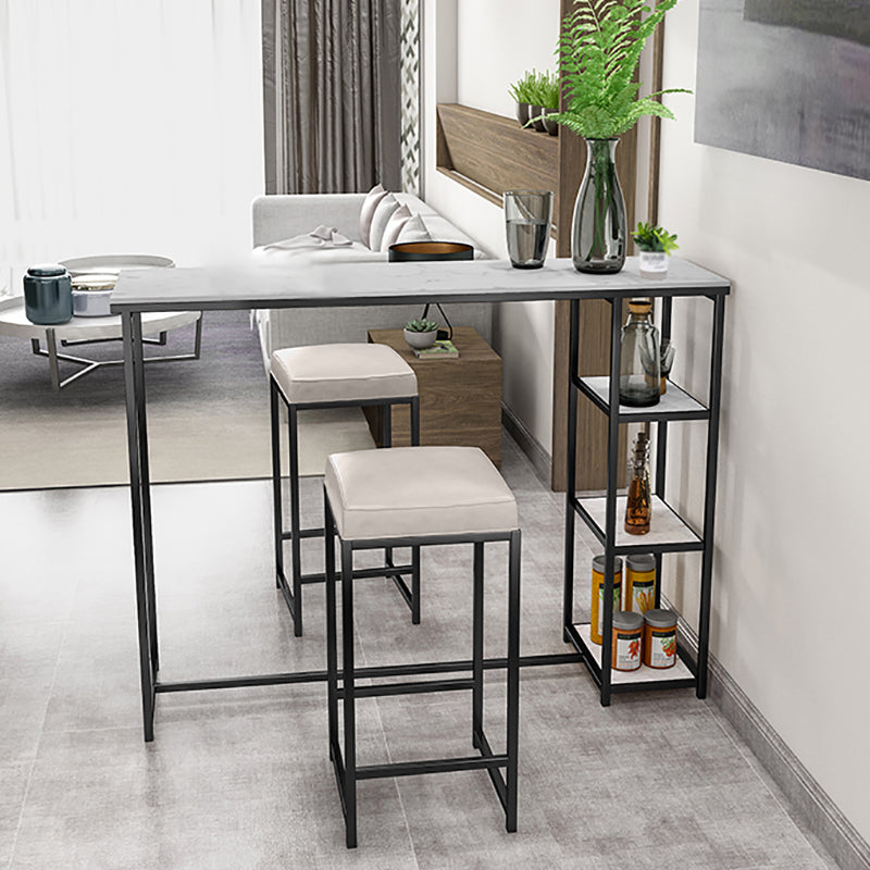 Glam Rectangle Indoor Bar Dining Table Iron Trestle Pedestal Bistro Table with Shelve 55.1"L x 15.7"W x 41.3"H Black Clearhalo 'Bar Furniture' 'Bar Tables' 'bar_tables' 'furn' 'furn_bar_tables' 'Furniture' 'furniture_bar_tables' 'Kitchen & Dining Furniture' 'kitchen&dining_furn' 'kitchen' 4335379
