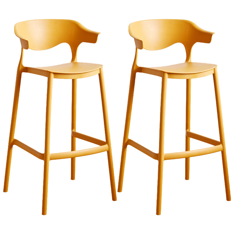Stackable Plastic Indoor Counter Stools Low Back Scandinavian Bar Stools with Footrest Yellow 2 Piece Set Bar Stool(30"H) Clearhalo 'Bar Furniture' 'Bar Stools' 'bar_stools' 'furn' 'furn_bar_stools' 'furniture_bar_stools' 'Kitchen & Dining Furniture' 'kitchen&dining_furn' 'kitchen' 'kitchen_furn' Furniture' 4339783