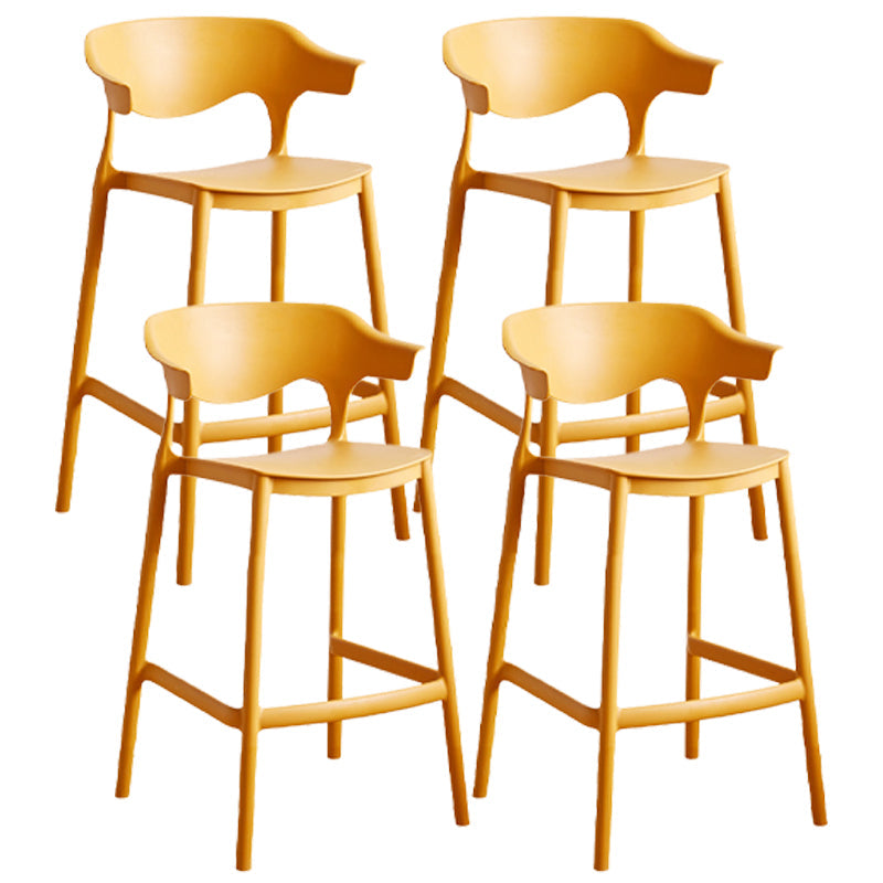 Stackable Plastic Indoor Counter Stools Low Back Scandinavian Bar Stools with Footrest Yellow 4 Piece Set Counter Stool(26"H) Clearhalo 'Bar Furniture' 'Bar Stools' 'bar_stools' 'furn' 'furn_bar_stools' 'furniture_bar_stools' 'Kitchen & Dining Furniture' 'kitchen&dining_furn' 'kitchen' 'kitchen_furn' Furniture' 4339810