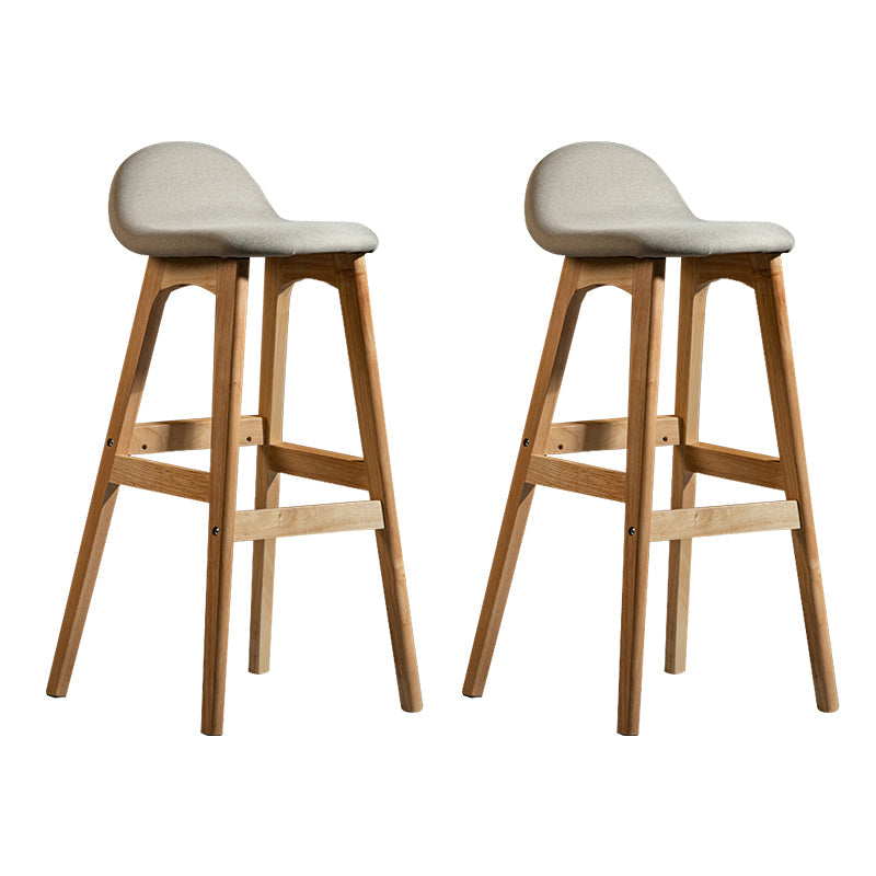 Contemporary 29-inch Indoor Bar Stool Wood Armless Low Back Stool with Footrest Light Apricot Natural 2 Piece Set Clearhalo 'Bar Furniture' 'Bar Stools' 'bar_stools' 'furn' 'furn_bar_stools' 'furniture_bar_stools' 'Kitchen & Dining Furniture' 'kitchen&dining_furn' 'kitchen' 'kitchen_furn' Furniture' 4344450
