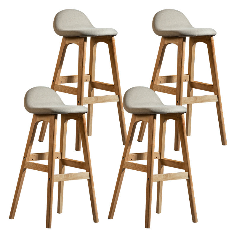 Contemporary 29-inch Indoor Bar Stool Wood Armless Low Back Stool with Footrest Light Apricot Natural 4 Piece Set Clearhalo 'Bar Furniture' 'Bar Stools' 'bar_stools' 'furn' 'furn_bar_stools' 'furniture_bar_stools' 'Kitchen & Dining Furniture' 'kitchen&dining_furn' 'kitchen' 'kitchen_furn' Furniture' 4344466