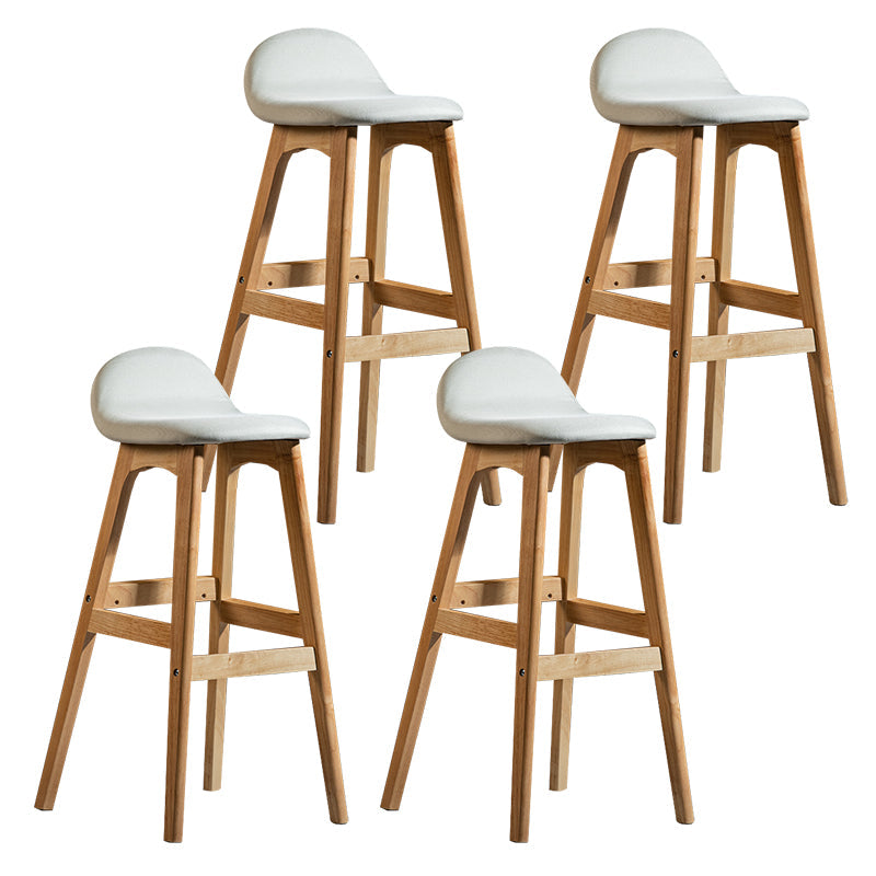Contemporary 29-inch Indoor Bar Stool Wood Armless Low Back Stool with Footrest Beige Natural 4 Piece Set Clearhalo 'Bar Furniture' 'Bar Stools' 'bar_stools' 'furn' 'furn_bar_stools' 'furniture_bar_stools' 'Kitchen & Dining Furniture' 'kitchen&dining_furn' 'kitchen' 'kitchen_furn' Furniture' 4344470