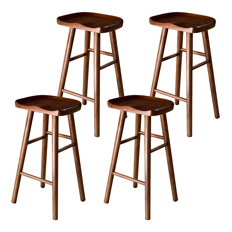 Modern Saddle Seat Bar Stool Pine Backless Footrest Counter Stool with Wood Legs Walnut 4 Piece Set Short Stool(22"H) Clearhalo 'Bar Furniture' 'Bar Stools' 'bar_stools' 'furn' 'furn_bar_stools' 'furniture_bar_stools' 'Kitchen & Dining Furniture' 'kitchen&dining_furn' 'kitchen' 'kitchen_furn' Furniture' 4344520