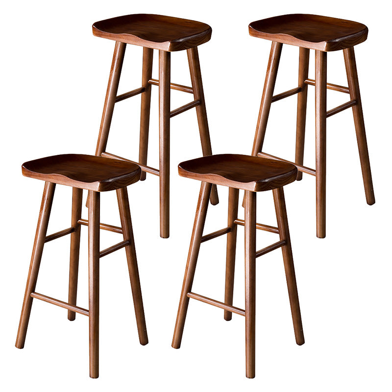 Modern Saddle Seat Bar Stool Pine Backless Footrest Counter Stool with Wood Legs Walnut 4 Piece Set Counter Stool(26"H) Clearhalo 'Bar Furniture' 'Bar Stools' 'bar_stools' 'furn' 'furn_bar_stools' 'furniture_bar_stools' 'Kitchen & Dining Furniture' 'kitchen&dining_furn' 'kitchen' 'kitchen_furn' Furniture' 4344521