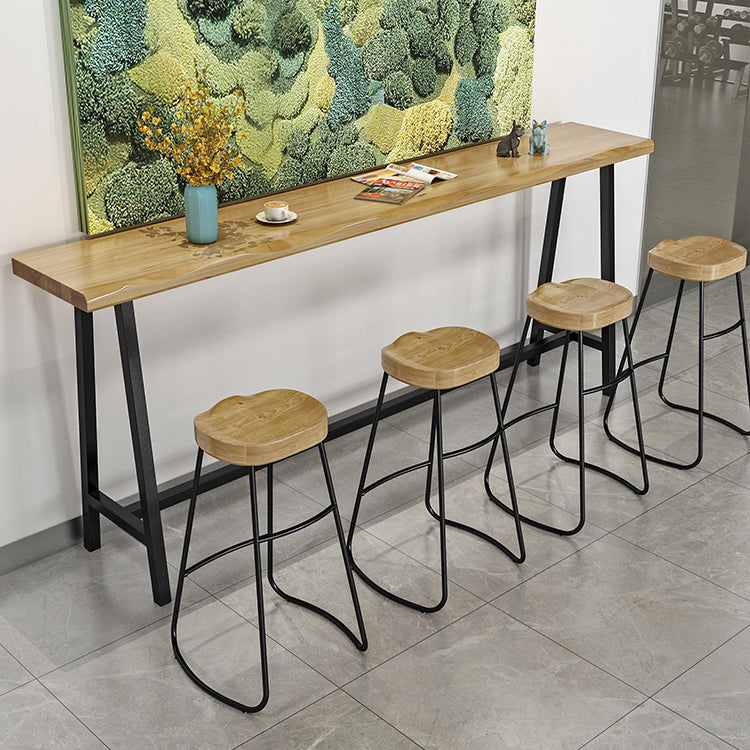 Natural and Black Modern Counter Table Trestle Footrest Bistro Bar Table 102.4"L x 15.7"W x 41.3"H Without Chairs Clearhalo 'Bar Furniture' 'Bar Tables' 'bar_tables' 'furn' 'furn_bar_tables' 'Furniture' 'furniture_bar_tables' 'Kitchen & Dining Furniture' 4344991