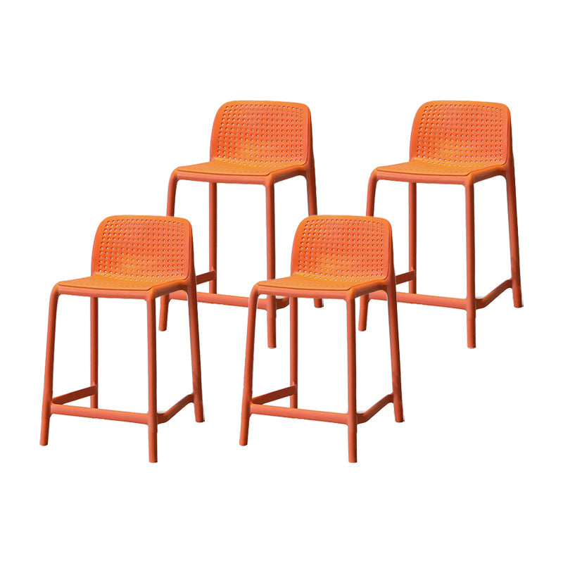 Modern Armless Backrest Counter Stool Plastic Cafe Bar Stool with Plastic Seat Orange 4 Piece Set Short Stool(20"H) Clearhalo 'Bar Furniture' 'Bar Stools' 'bar_stools' 'furn' 'furn_bar_stools' 'furniture_bar_stools' 'Kitchen & Dining Furniture' 'kitchen&dining_furn' 'kitchen' 'kitchen_furn' Furniture' 4371778