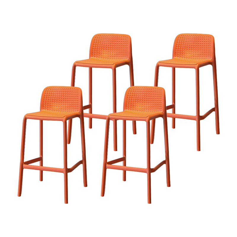 Modern Armless Backrest Counter Stool Plastic Cafe Bar Stool with Plastic Seat Orange 4 Piece Set Short Stool(22"H) Clearhalo 'Bar Furniture' 'Bar Stools' 'bar_stools' 'furn' 'furn_bar_stools' 'furniture_bar_stools' 'Kitchen & Dining Furniture' 'kitchen&dining_furn' 'kitchen' 'kitchen_furn' Furniture' 4371814