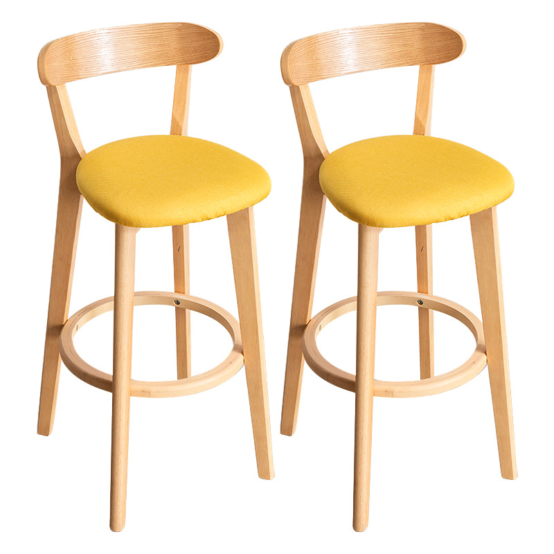 Modern Armless Backrest Counter Stool Wood Household Bar Stool with Cushion and Pedal Yellow Natural 2 Piece Set Clearhalo 'Bar Furniture' 'Bar Stools' 'bar_stools' 'furn' 'furn_bar_stools' 'furniture_bar_stools' 'Kitchen & Dining Furniture' 'kitchen&dining_furn' 'kitchen' 'kitchen_furn' Furniture' 4372107