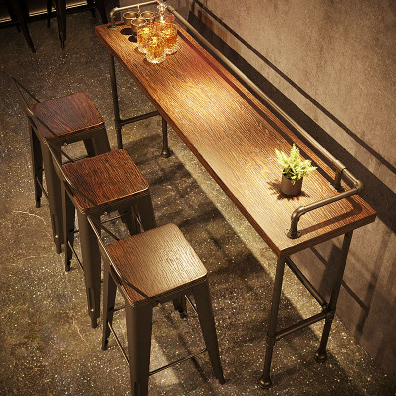 Industrial Black Iron Bar Table Brown Wood Rectangle Top 41.3"H Bistro Table 59.1"L x 17.7"W x 41.3"H Without Chairs Clearhalo 'Bar Furniture' 'Bar Tables' 'bar_tables' 'furn' 'furn_bar_tables' 'Furniture' 'furniture_bar_tables' 'Kitchen & Dining Furniture' 'kitchen&dining_furn' 'kitchen' 4380953