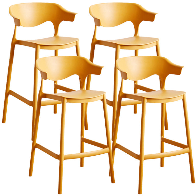 Stackable Plastic Indoor Counter Stools Low Back Scandinavian Bar Stools with 4 Legs Yellow 4 Piece Set Counter Stool(26"H) Clearhalo 'Bar Furniture' 'Bar Stools' 'bar_stools' 'furn' 'furn_bar_stools' 'furniture_bar_stools' 'Kitchen & Dining Furniture' 'kitchen&dining_furn' 'kitchen' 'kitchen_furn' Furniture' 4392536