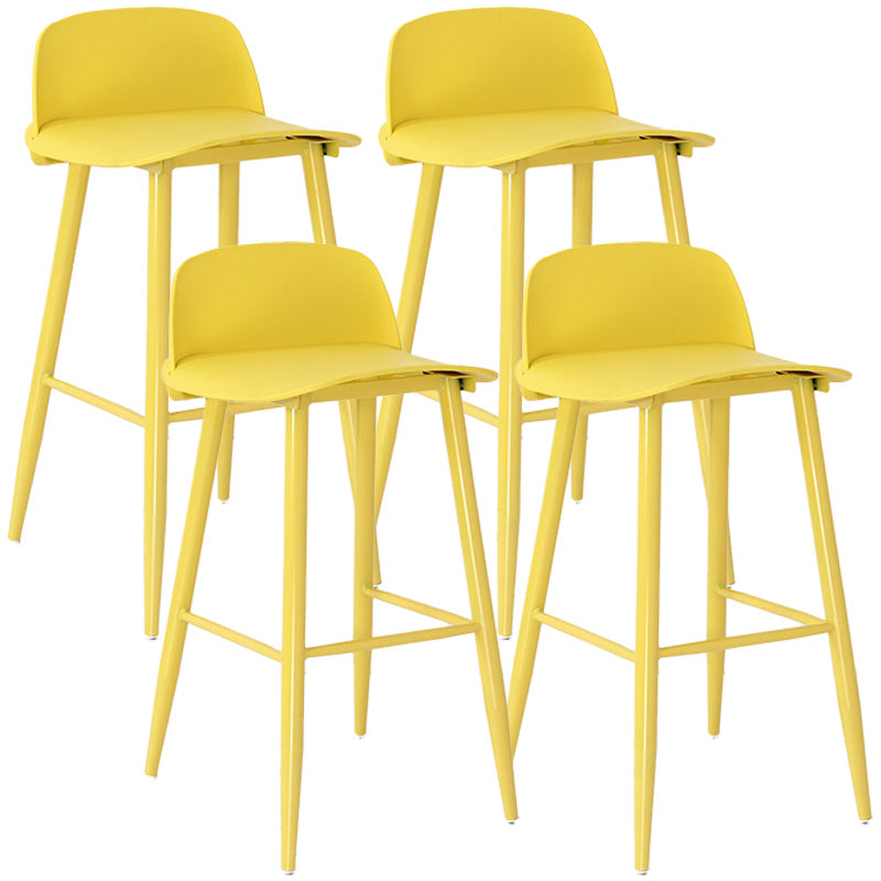 Scandinavian Plastic Counter Stools Low Back Indoor Bar Stools with Metal Footrest Yellow 4 Piece Set Clearhalo 'Bar Furniture' 'Bar Stools' 'bar_stools' 'furn' 'furn_bar_stools' 'furniture_bar_stools' 'Kitchen & Dining Furniture' 'kitchen&dining_furn' 'kitchen' 'kitchen_furn' Furniture' 4392626