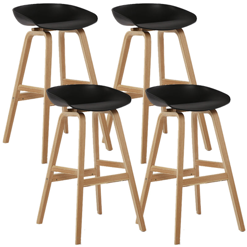 Wood Plastic Counter Stools Backless Scandinavian Bar Stools with Bucket Seat Natural Black 4 Piece Set Clearhalo 'Bar Furniture' 'Bar Stools' 'bar_stools' 'furn' 'furn_bar_stools' 'furniture_bar_stools' 'Kitchen & Dining Furniture' 'kitchen&dining_furn' 'kitchen' 'kitchen_furn' Furniture' 4392814