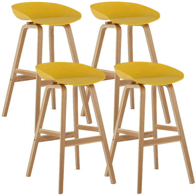 Wood Plastic Counter Stools Backless Scandinavian Bar Stools with Bucket Seat Natural Yellow 4 Piece Set Clearhalo 'Bar Furniture' 'Bar Stools' 'bar_stools' 'furn' 'furn_bar_stools' 'furniture_bar_stools' 'Kitchen & Dining Furniture' 'kitchen&dining_furn' 'kitchen' 'kitchen_furn' Furniture' 4392845