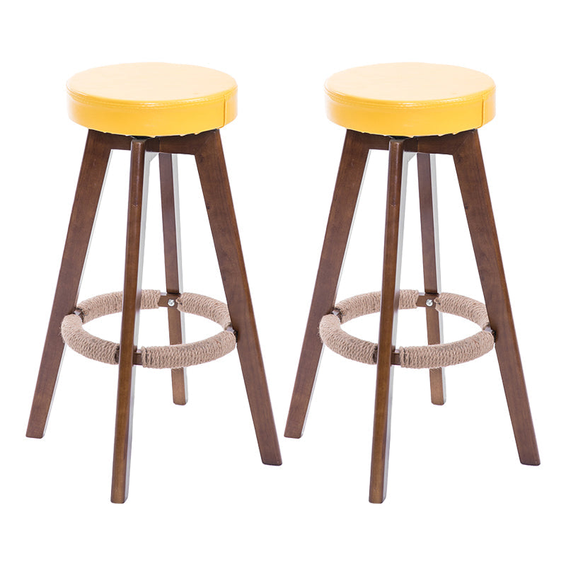 Modern Counter Bar Stool Armless Leather Bar Stool with Footrest and Swivel, Wood Base Brown Yellow 2 Piece Set Clearhalo 'Bar Furniture' 'Bar Stools' 'bar_stools' 'furn' 'furn_bar_stools' 'furniture_bar_stools' 'Kitchen & Dining Furniture' 'kitchen&dining_furn' 'kitchen' 'kitchen_furn' Furniture' 4400917