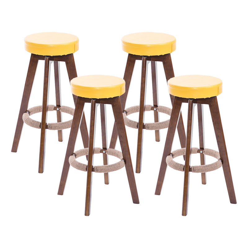 Modern Counter Bar Stool Armless Leather Bar Stool with Footrest and Swivel, Wood Base Brown Yellow 4 Piece Set Clearhalo 'Bar Furniture' 'Bar Stools' 'bar_stools' 'furn' 'furn_bar_stools' 'furniture_bar_stools' 'Kitchen & Dining Furniture' 'kitchen&dining_furn' 'kitchen' 'kitchen_furn' Furniture' 4400918