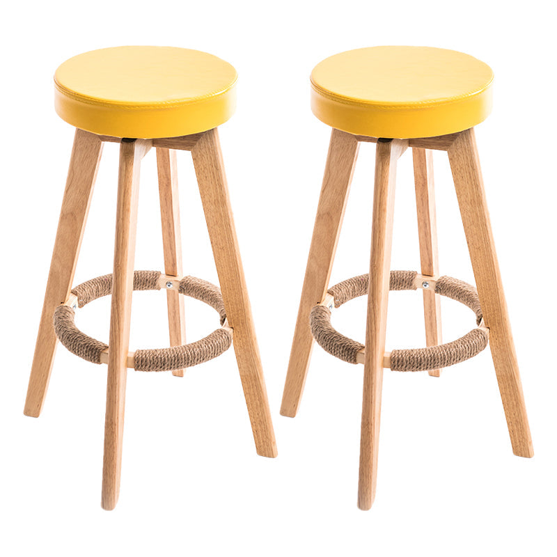 Modern Counter Bar Stool Armless Leather Bar Stool with Footrest and Swivel, Wood Base Natural Yellow 2 Piece Set Clearhalo 'Bar Furniture' 'Bar Stools' 'bar_stools' 'furn' 'furn_bar_stools' 'furniture_bar_stools' 'Kitchen & Dining Furniture' 'kitchen&dining_furn' 'kitchen' 'kitchen_furn' Furniture' 4400923