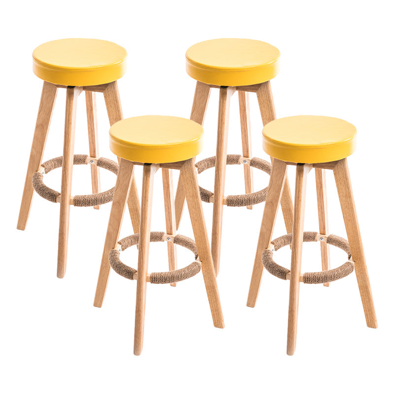 Modern Counter Bar Stool Armless Leather Bar Stool with Footrest and Swivel, Wood Base Natural Yellow 4 Piece Set Clearhalo 'Bar Furniture' 'Bar Stools' 'bar_stools' 'furn' 'furn_bar_stools' 'furniture_bar_stools' 'Kitchen & Dining Furniture' 'kitchen&dining_furn' 'kitchen' 'kitchen_furn' Furniture' 4400924