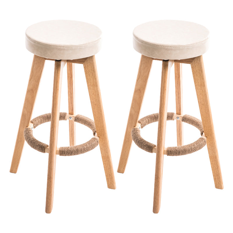 Modern Counter Bar Stool Armless Leather Bar Stool with Footrest and Swivel, Wood Base Natural Beige 2 Piece Set Clearhalo 'Bar Furniture' 'Bar Stools' 'bar_stools' 'furn' 'furn_bar_stools' 'furniture_bar_stools' 'Kitchen & Dining Furniture' 'kitchen&dining_furn' 'kitchen' 'kitchen_furn' Furniture' 4400935