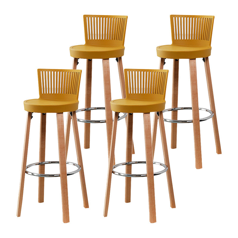 Contemporary Counter Bar Stool Plastic Armless Bar Stool with Wood Base Yellow 4 Piece Set Clearhalo 'Bar Furniture' 'Bar Stools' 'bar_stools' 'furn' 'furn_bar_stools' 'furniture_bar_stools' 'Kitchen & Dining Furniture' 'kitchen&dining_furn' 'kitchen' 'kitchen_furn' Furniture' 4400979