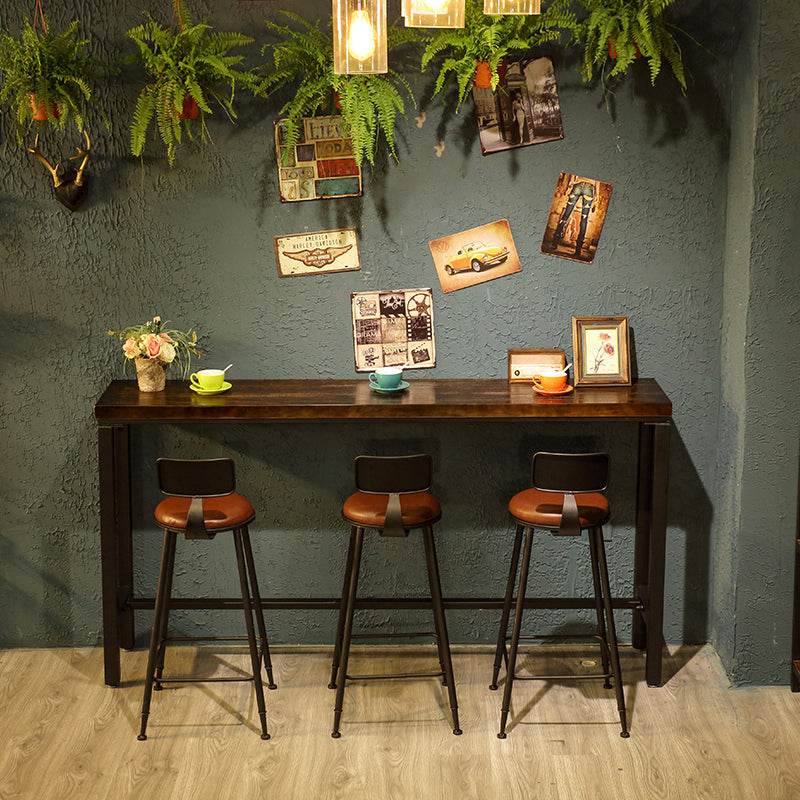 Brown Wood Top Counter Table Metal Black Legs Industrial Bar Table for Restaurant 63"L x 15.7"W x 41.3"H Without Chairs Clearhalo 'Bar Furniture' 'Bar Tables' 'bar_tables' 'furn' 'furn_bar_tables' 'Furniture' 'furniture_bar_tables' 'Kitchen & Dining Furniture' 4401466