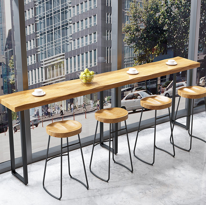 Modern Brown Wood Pub Table Rectangle Table Top Black Sled Table 42'' H 86.6"L x 15.7"W x 41.3"H Light Wood Without Chairs Clearhalo 'Bar Furniture' 'Bar Tables' 'bar_tables' 'furn' 'furn_bar_tables' 'Furniture' 'furniture_bar_tables' 'Kitchen & Dining Furniture' 4431077
