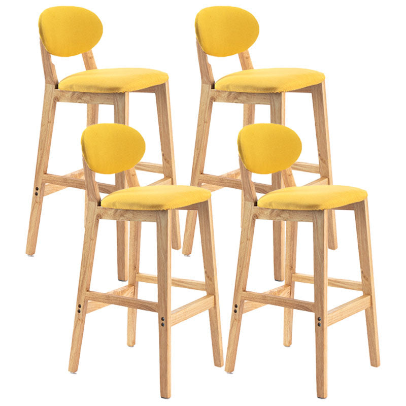 Modern Armless Backrest Counter Stool Wood Dessert Shop Bar Stool with Cushion and Pedal Yellow 4 Piece Set Clearhalo 'Bar Furniture' 'Bar Stools' 'bar_stools' 'furn' 'furn_bar_stools' 'furniture_bar_stools' 'Kitchen & Dining Furniture' 'kitchen&dining_furn' 'kitchen' 'kitchen_furn' Furniture' 4463824