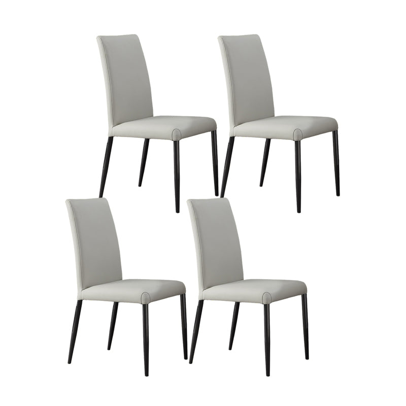 Industrial Design Solid Back Dining Side Chairs Faux Leather Dining Chairs White 4 Piece Set Clearhalo ' kitchen&dining_furn' 'Dining Chairs' 'Dining Tables & Seating' 'dining_chair' 'furn' 'furn_dining_chair' 'Furniture' 'furniture_dining_chair' 'Kitchen & Dining Furniture' 'kitchen' 4511426