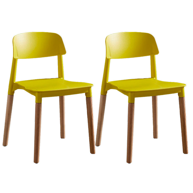 Scandinavian Design Open Back Dining Side Chairs Plastic Dining Armless Chair Yellow 2 Piece Set Clearhalo ' kitchen&dining_furn' 'Dining Chairs' 'Dining Tables & Seating' 'dining_chair' 'furn' 'furn_dining_chair' 'Furniture' 'furniture_dining_chair' 'Kitchen & Dining Furniture' 'kitchen' 4523655