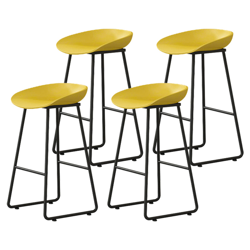 Modern Armless Backrest Counter Stool Iron Household Bar Stool with Plastic Seat and Pedal Yellow 4 Piece Set Counter Stool(26"H) Clearhalo 'Bar Furniture' 'Bar Stools' 'bar_stools' 'furn' 'furn_bar_stools' 'furniture_bar_stools' 'Kitchen & Dining Furniture' 'kitchen&dining_furn' 'kitchen' 'kitchen_furn' Furniture' 4527378
