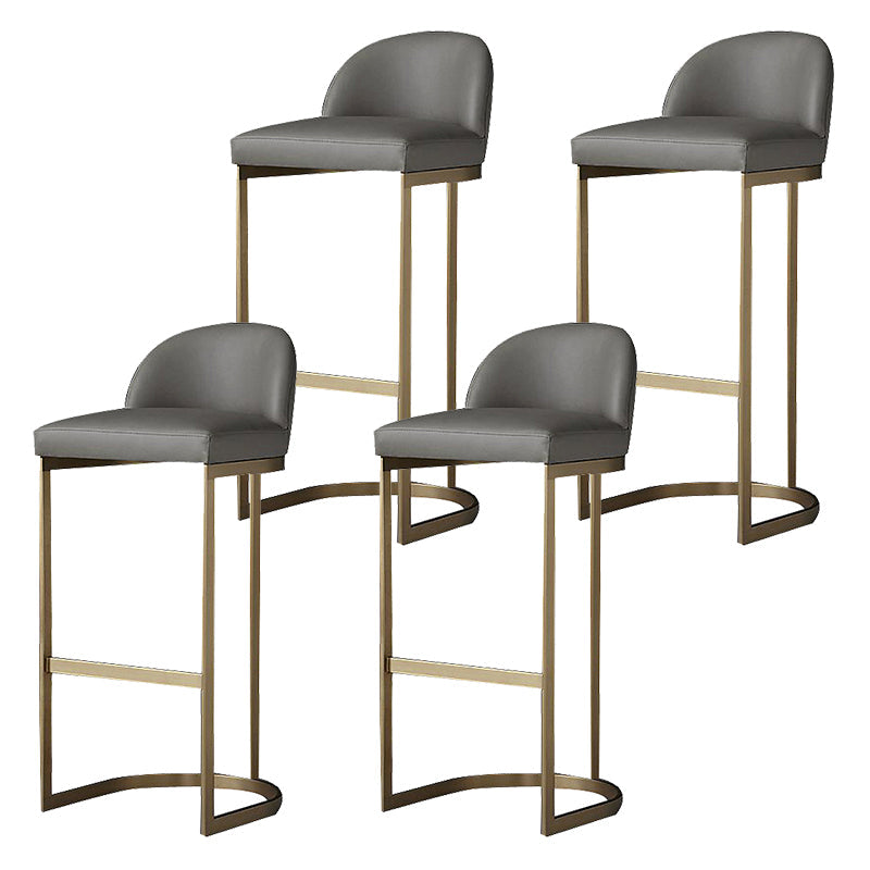 Glam Mental Leather Bar Stools Indoor Barstool with Iron Legs and Low Back Gold 4 Piece Set Clearhalo 'Bar Furniture' 'Bar Stools' 'bar_stools' 'furn' 'furn_bar_stools' 'furniture_bar_stools' 'Kitchen & Dining Furniture' 'kitchen&dining_furn' 'kitchen' 'kitchen_furn' Furniture' 4536747